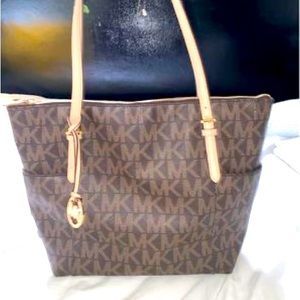 Michael Kors brown tote bag.